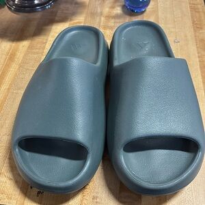 Preowned Yeezy slides size 11 -  grey